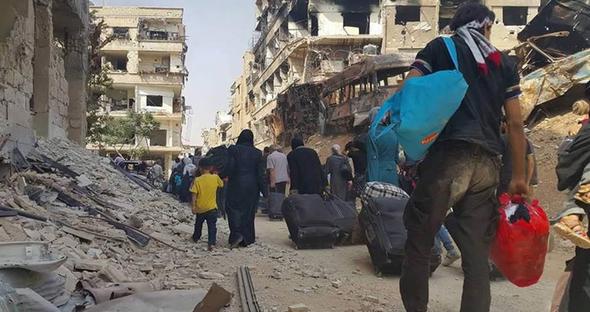 تصاویر : فرار از محاصره در حومه دمشق