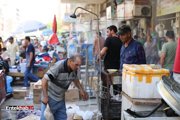 تصاویر : دوش آب سرد در خیابان‌های بغداد