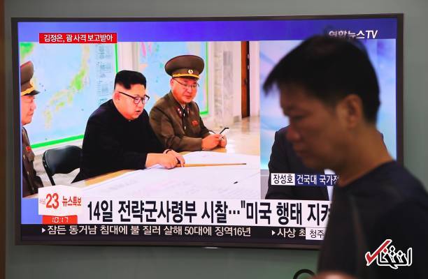 تصاویر : رهبر کره شمالی در حال بررسی حمله موشکی به گوام
