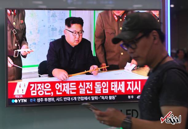 تصاویر : رهبر کره شمالی در حال بررسی حمله موشکی به گوام