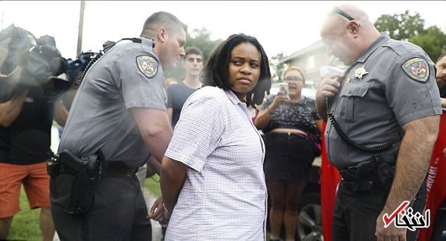 عکس/ بازداشت زنی که مجسمه برتری نژادی در آمریکا را سرنگون کرد