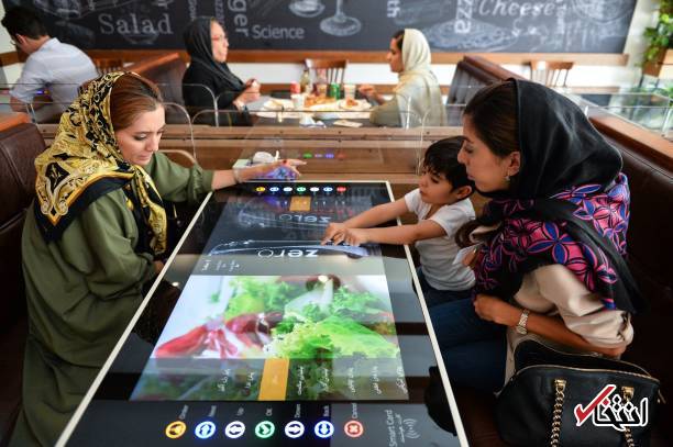 تصاویر : گزارش رسانه خارجی از اولین رستوران رباتیک ایران