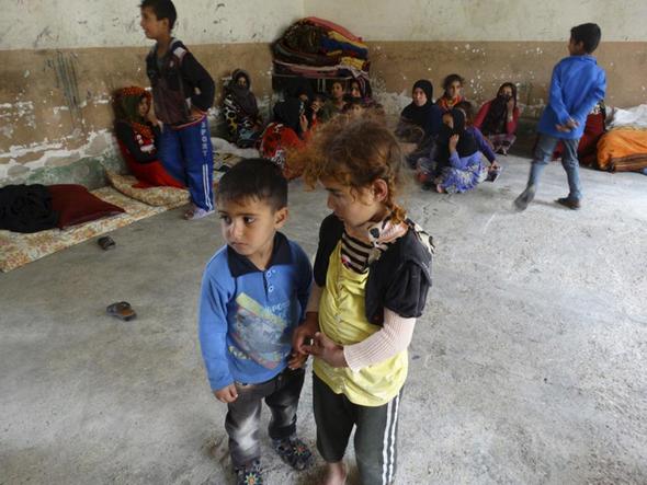 تصاویر : فرار مردم «الرمادی» از دست داعش